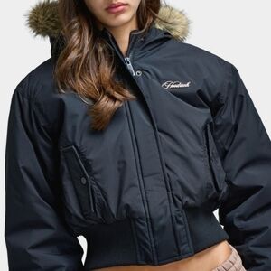 Sleek Black Hooded Puffer Jacket with Fur Trim